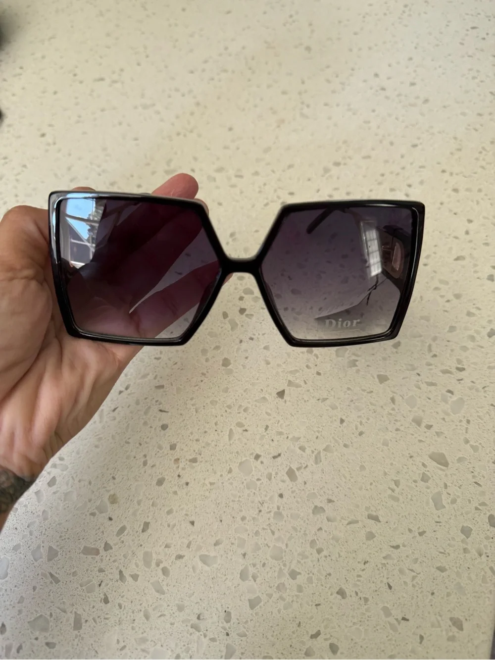 Generic Black Frame Sunglasses with Gold Temples and Purple Gradient Lenses
